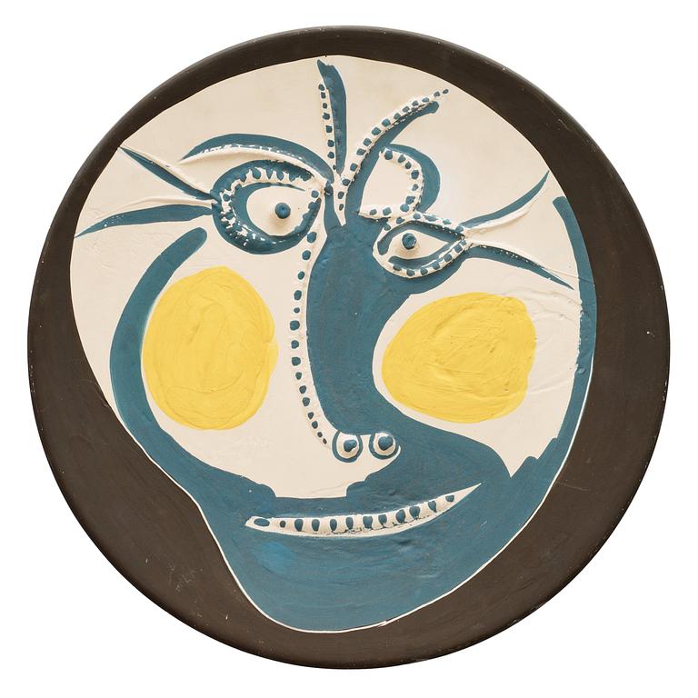 A Pablo Picasso earthenware dish 'Visage', Madoura, France 1960.