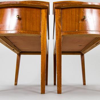 A pair of 20th century bedside tables.