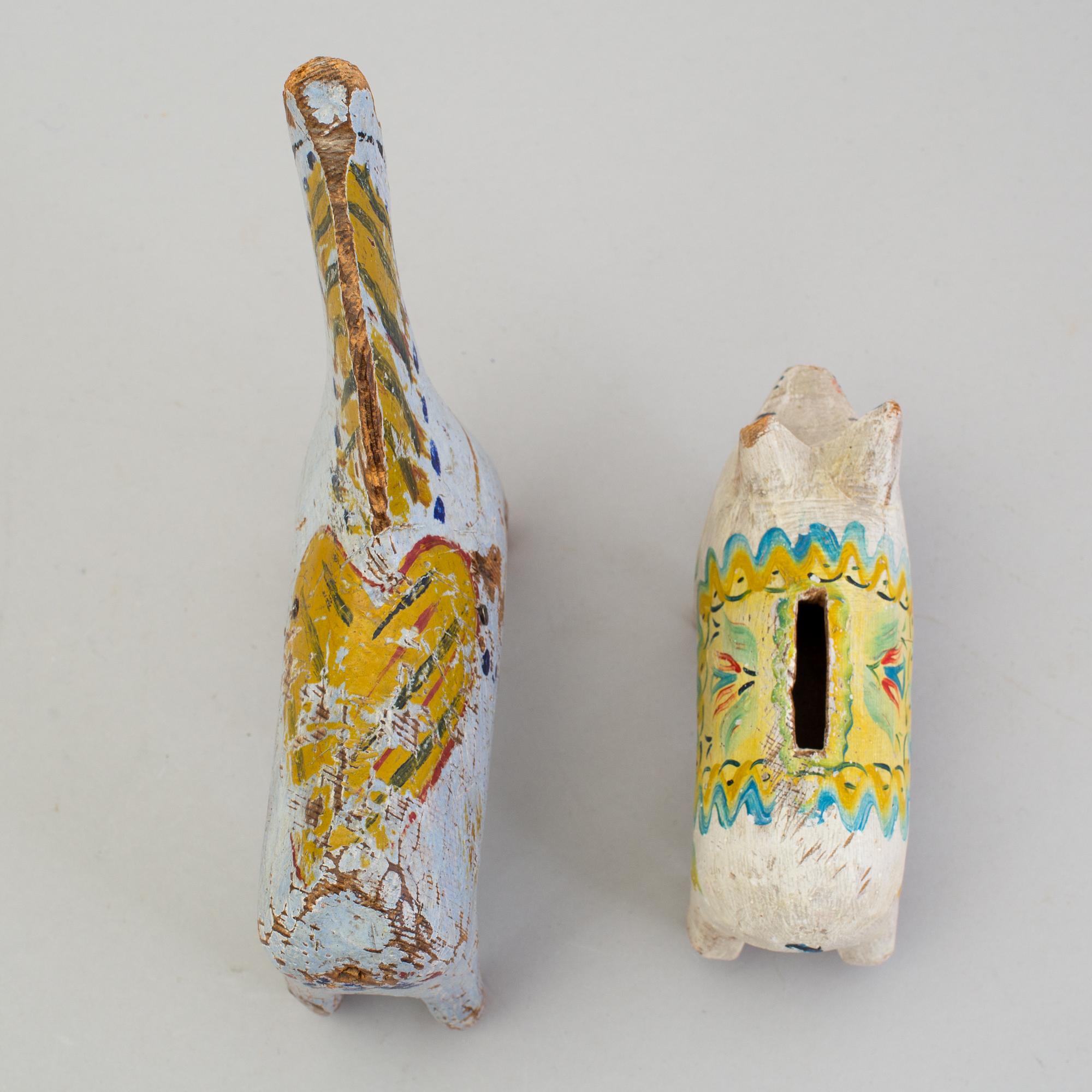 A painted folk art dala horse and dala pig, first half of the 20th century.