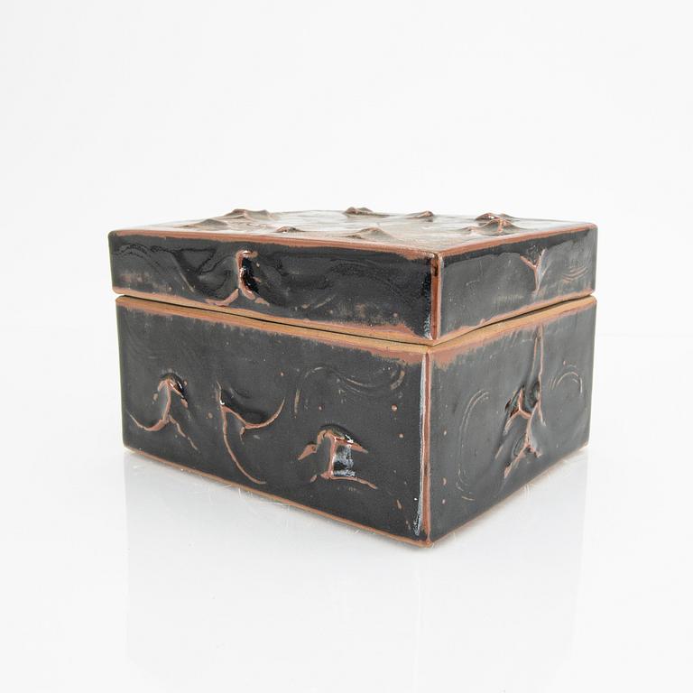 A glazed stone ware box.