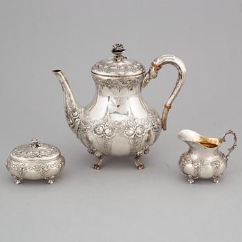 A silver coffee pot, creamer and sugar box. Swedish import mark.
