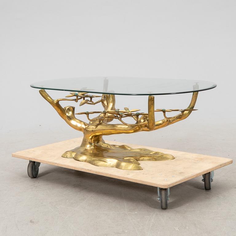 A brass and glass coffee table from the second half of the 20th century.