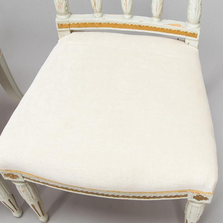 Four late Gustavian Stockholm chairs one signed EÖM  Erik Öhrmark turn of 18th/19th Century.