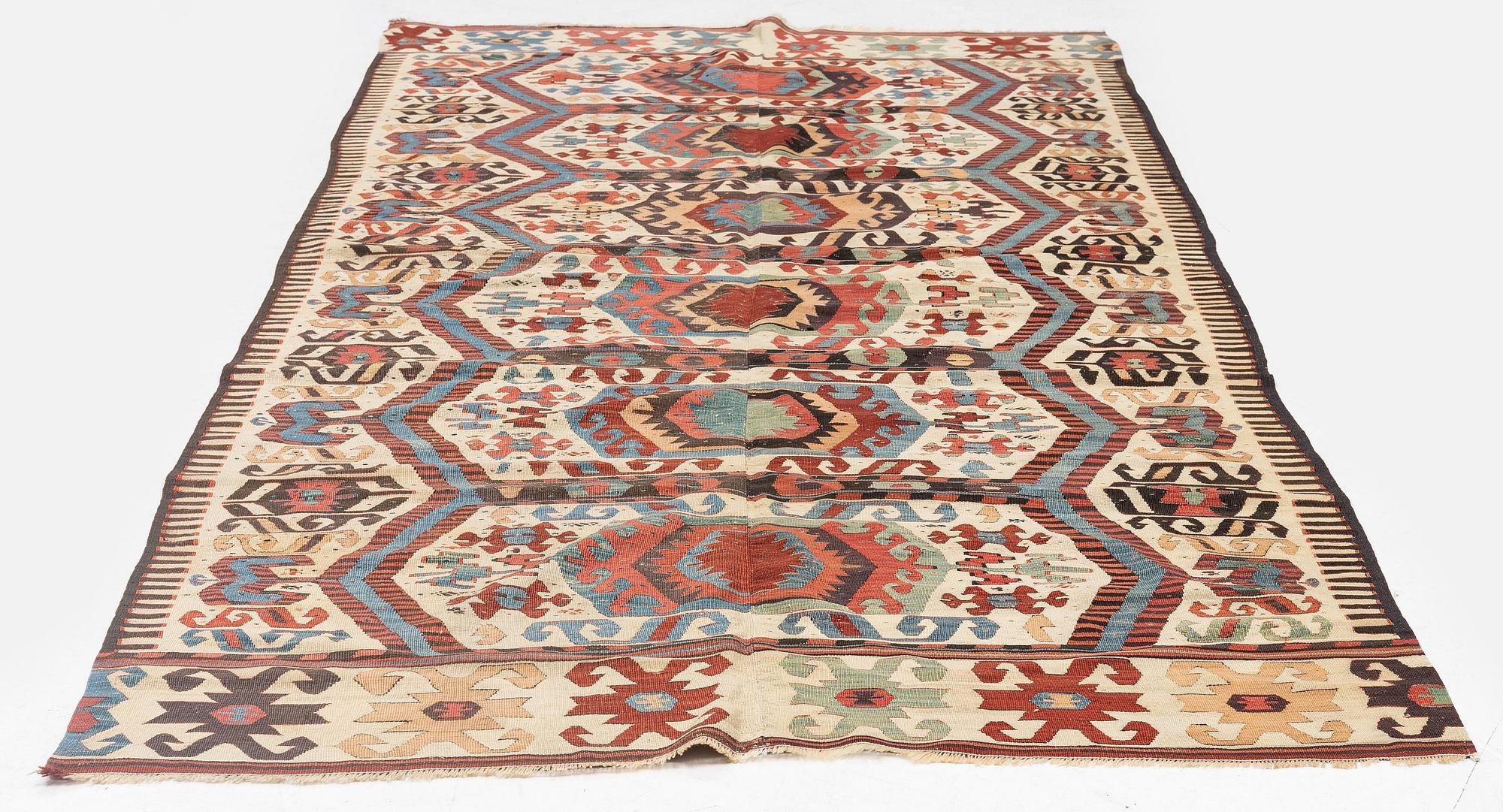 An antique central Anatolian kilim, possibly Konya, c. 339 x 140 cm.