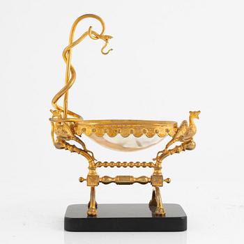 A gilt-brass, mother of pearl and diabase pocket-watch stand, late 19th century.