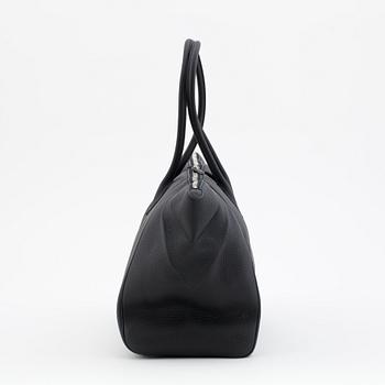 HERMÈS, a veau togo black shoulder bag, "Noisette".