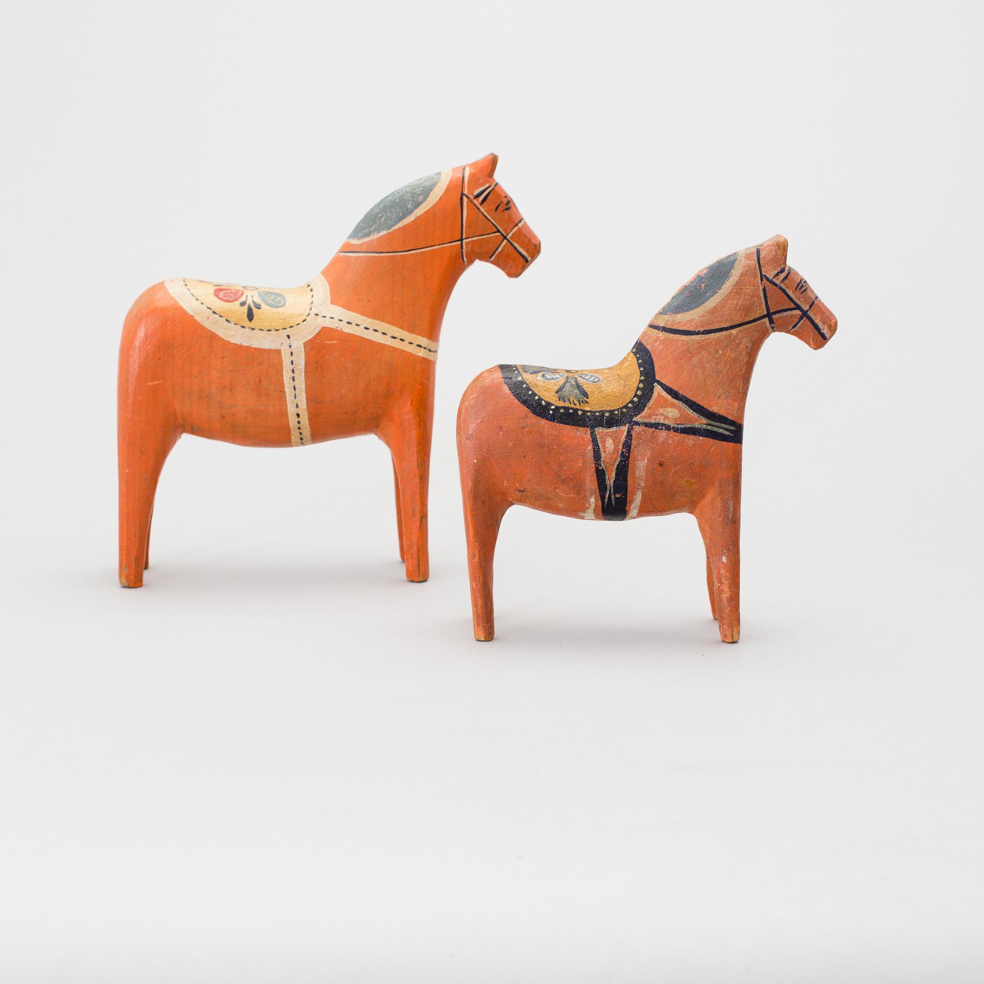 Two painted folk art dala horses first half of the 20th century.