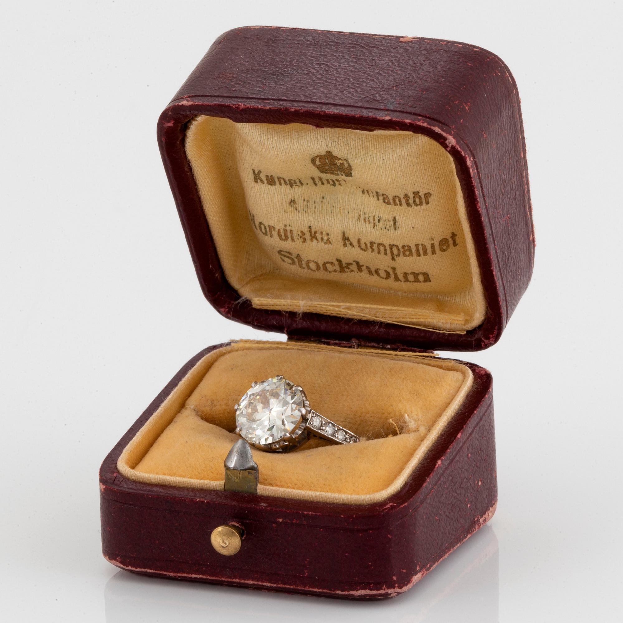 A platinum ring set with an old-cut diamond ca 2.25 cts quality ca K/L vs.
