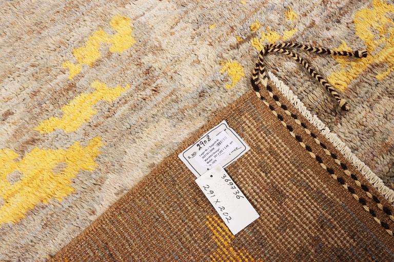 An Ushak Design carpet, a. 291 x 202 cm.