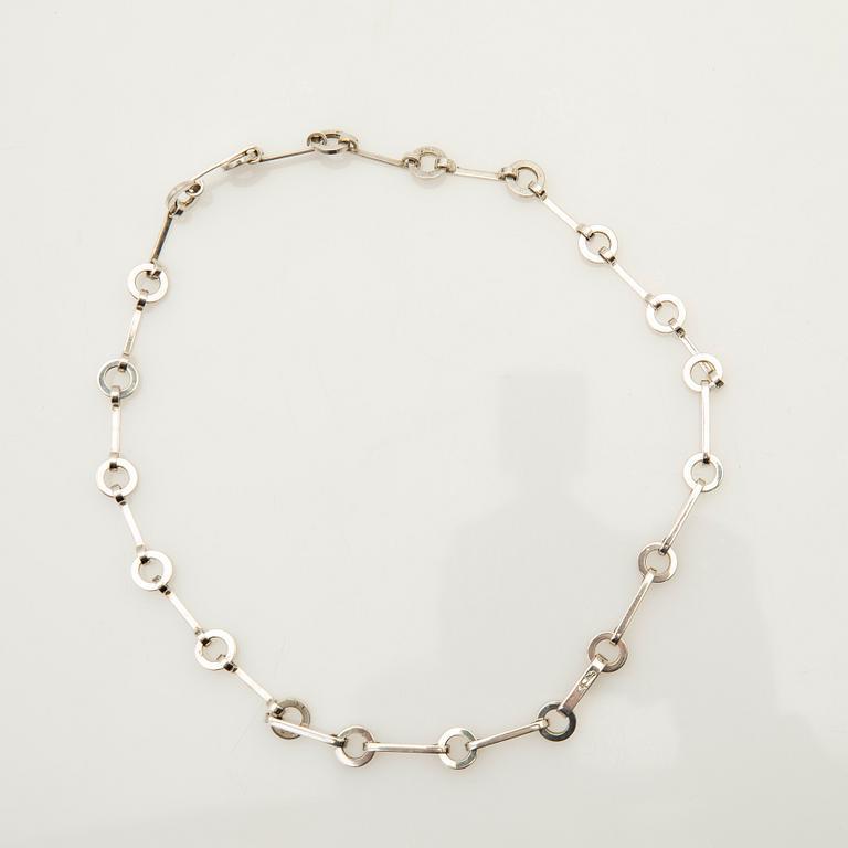 Efva Attling, halsband, ring, ett par örhängen, "Ring Chain", sterling silver.