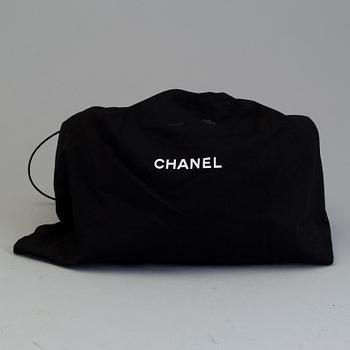 a Chanel "Boy Bag" 2016.