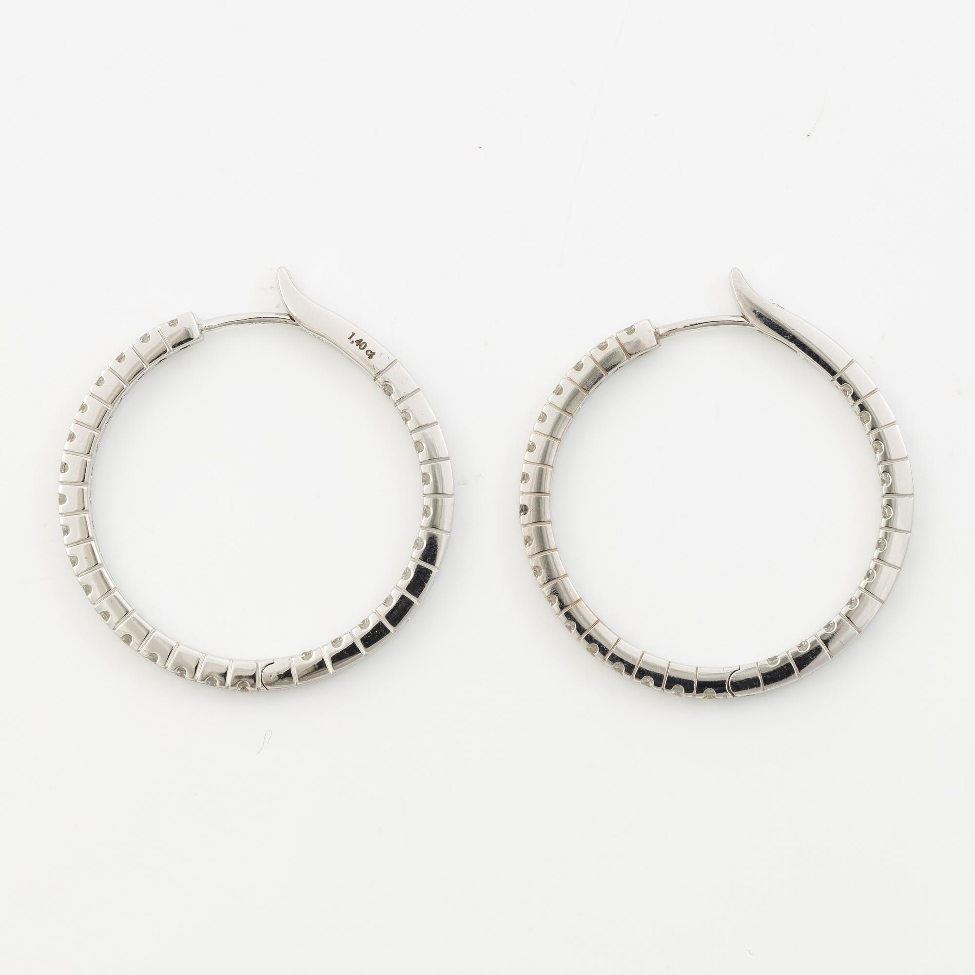 Earrings 18K white gold with brilliant-cut diamonds.