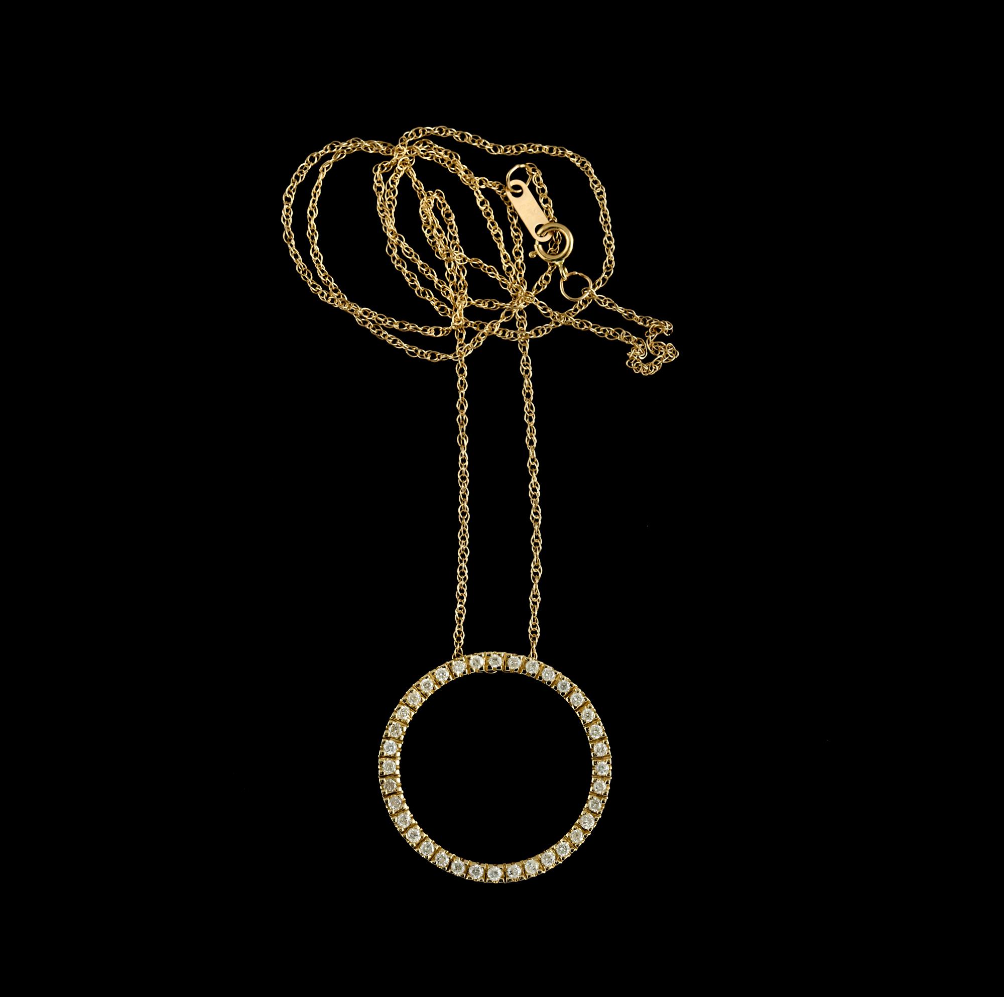 HÄNGE, 14K guld med briljantslipade diamanter, ca 0.70 ct. Vikt 2,7 g.
