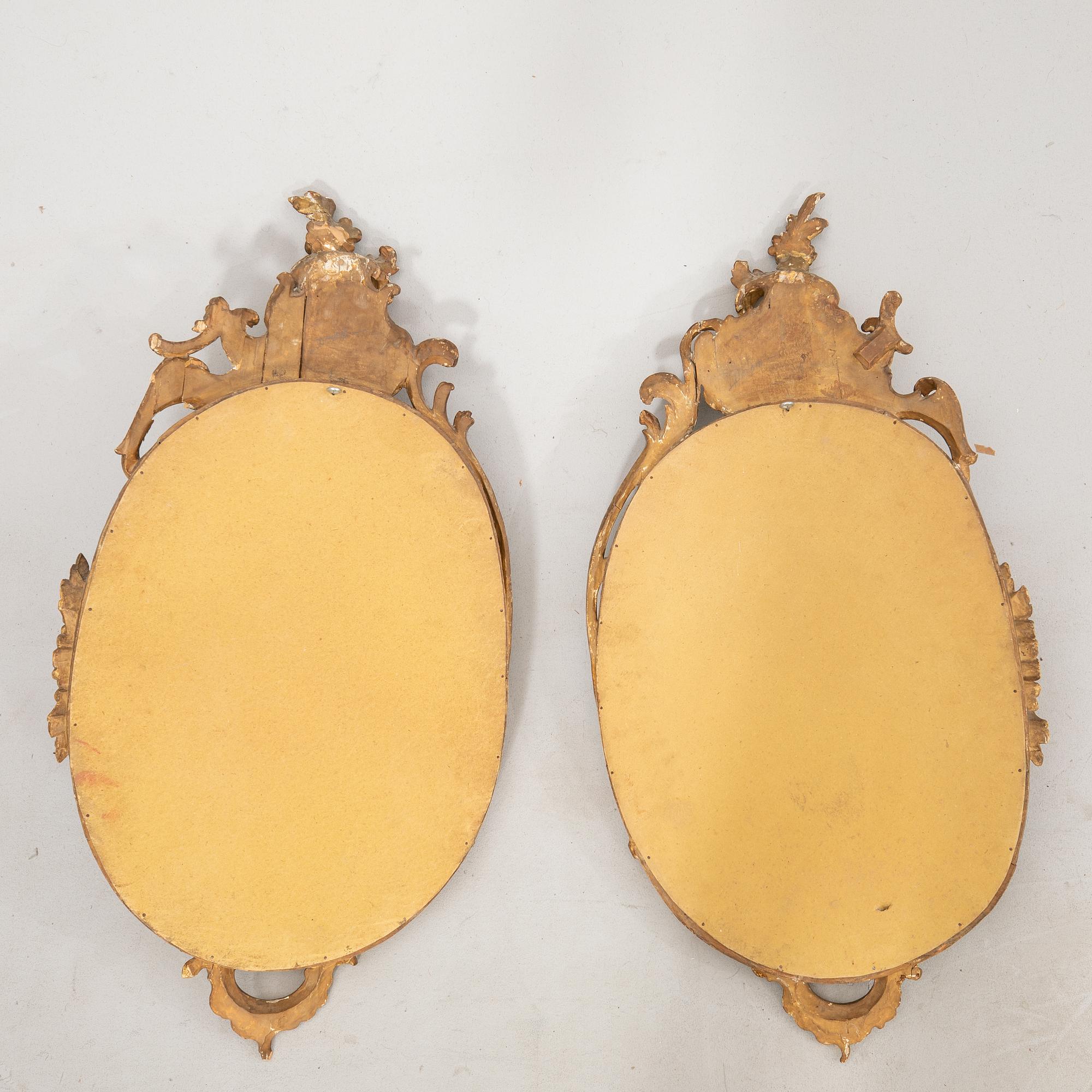 Mirrors, a pair in the Rococo style, circa 1900.