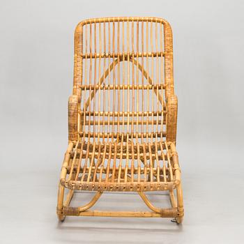 A rattan lounger, mid-20th century.