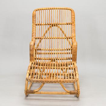 A rattan lounger, mid-20th century.