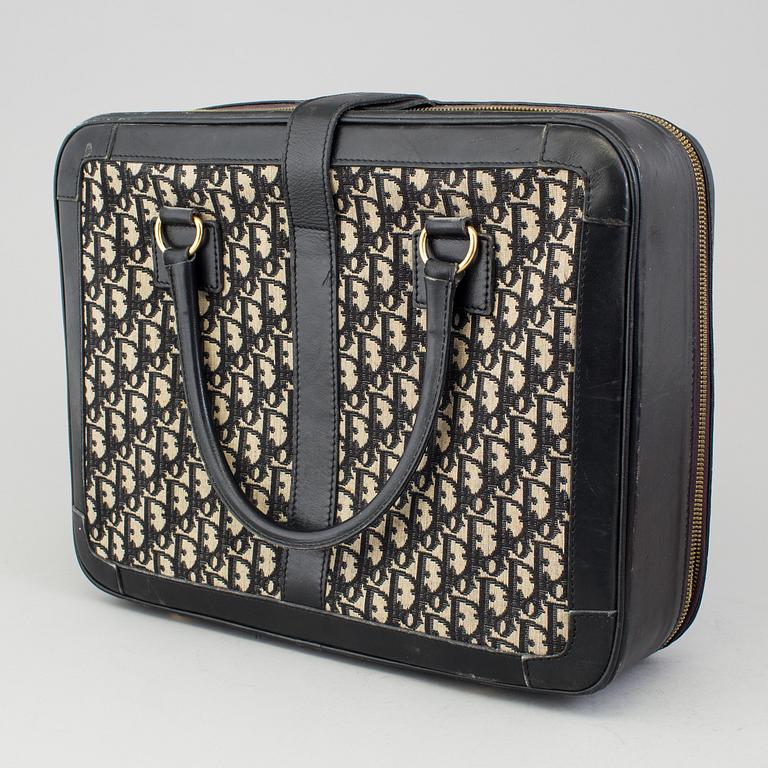 CHRISTIAN DIOR, a monogram canvas suitcase.