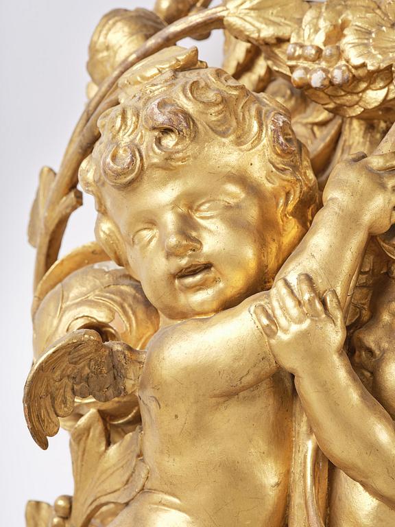 A presumably Dutch Louis XIV carved giltwood frame with mirror glass, in the style of Jean Le Pautre, late 17th century.