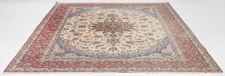 An Isfahan carpet, signed, approx. 372 x 255 cm.