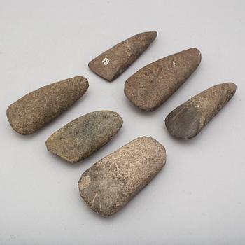 Six neolithic stone axes.