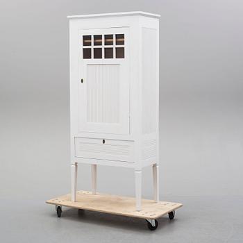 A circa 1900 Gustavian style cabinet.