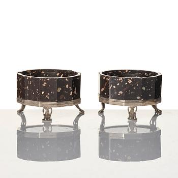 A pair of 'Lika-Risberg' porphyry Empire salts, Älvdalen, Sweden, early 19th century.