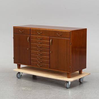 A mahogany veneered sideboard, mid 20th century.