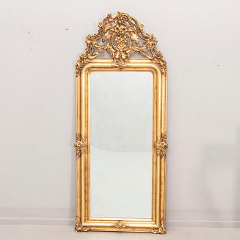 A bronzed Neo Rovovo mirror and table later part of the 19th century.