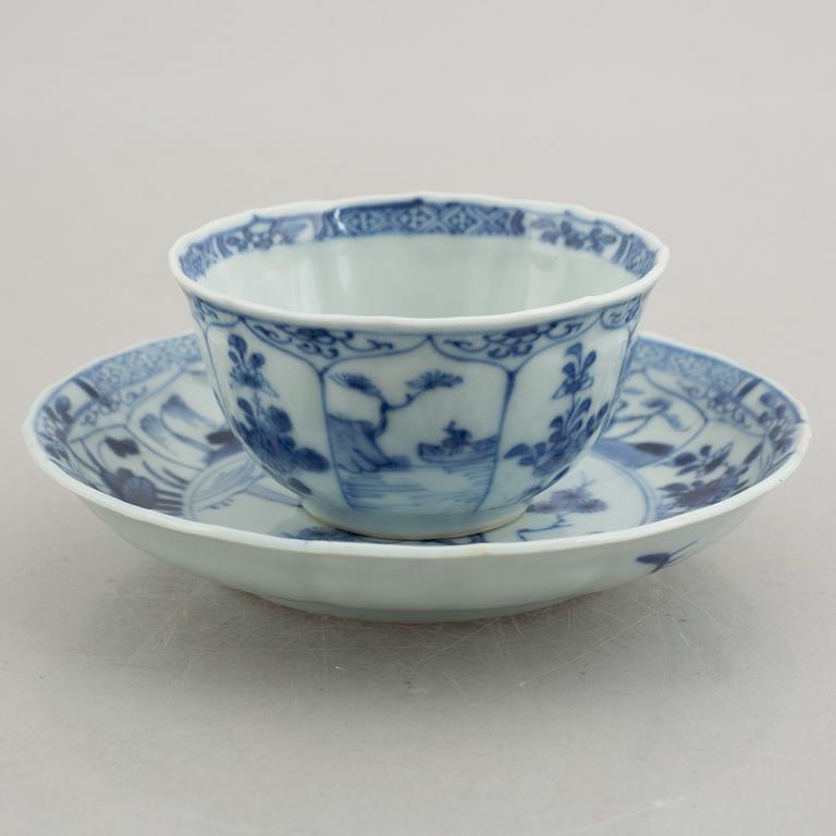 Three (a pair + one) blue and white cups with saucers, China, Kangxi (1662-1722).