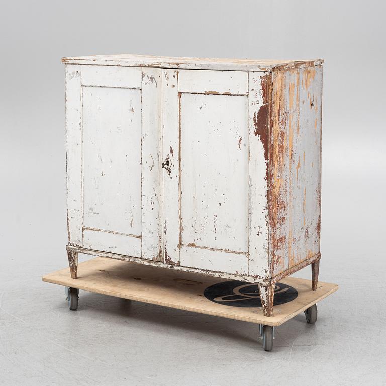 A painted cabinet from arond the year 1900.