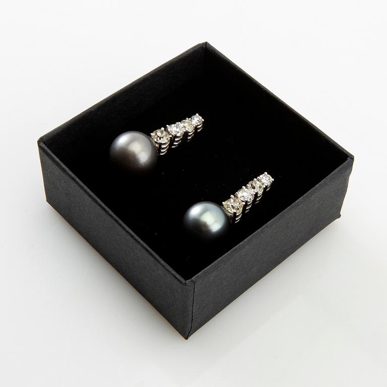 Earrings, a pair of 18K white gold with diamonds and cultured pearls.
