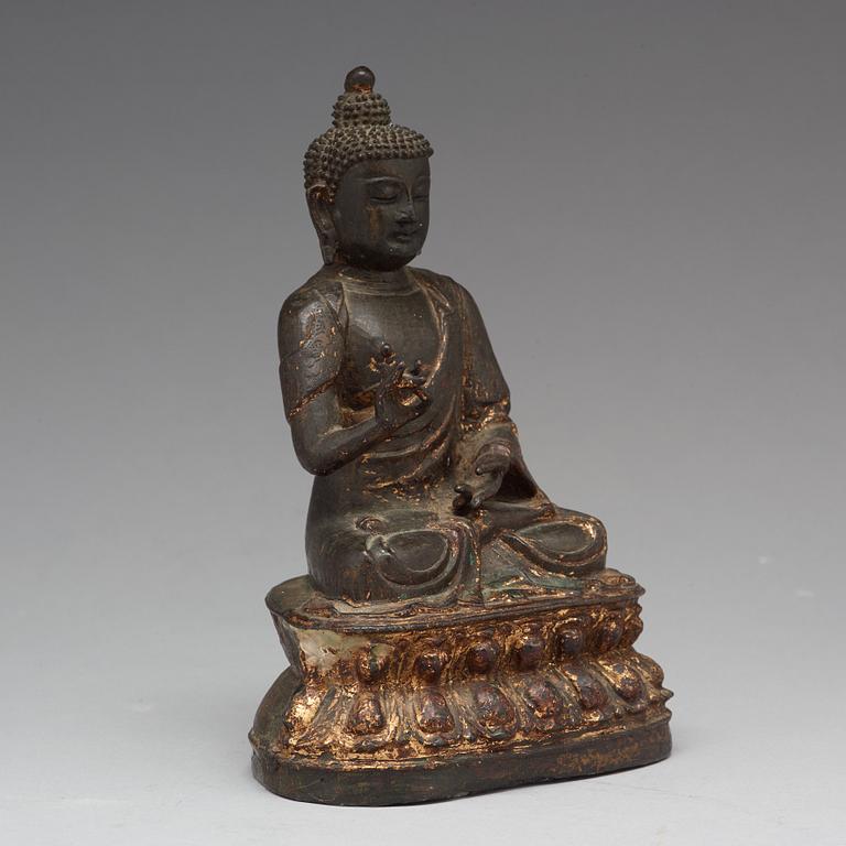 A bronze figure of Buddha, Ming dynasty (1368-1644).