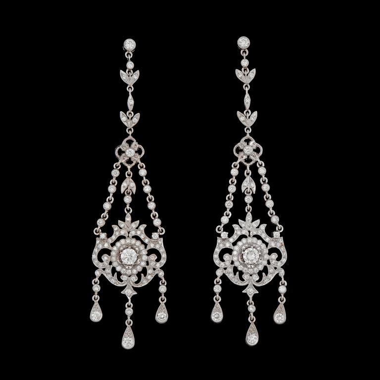 A pair of brilliant cut diamond, total carat weight circa 1.85 cts, earrings.