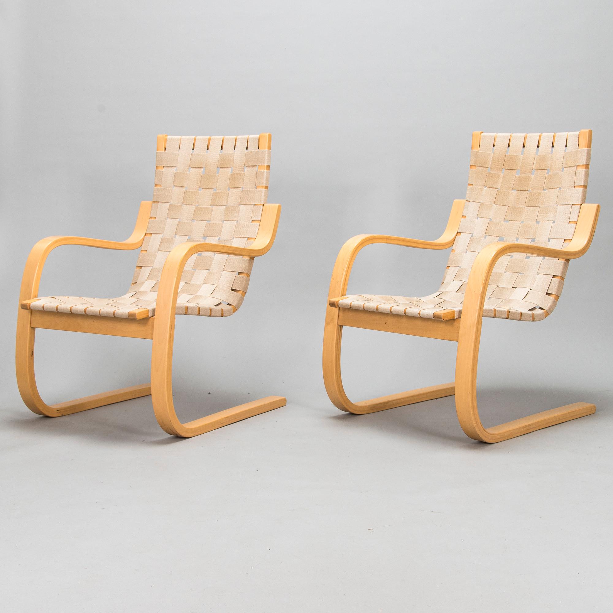 Alvar Aalto, a pair of late 1900s '406' armchairs for Artek.
