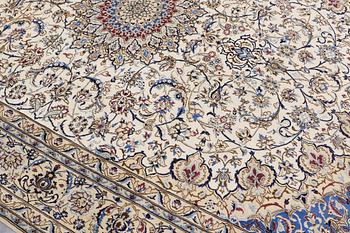 A carpet, Nain part silk, 364 x 256 cm.