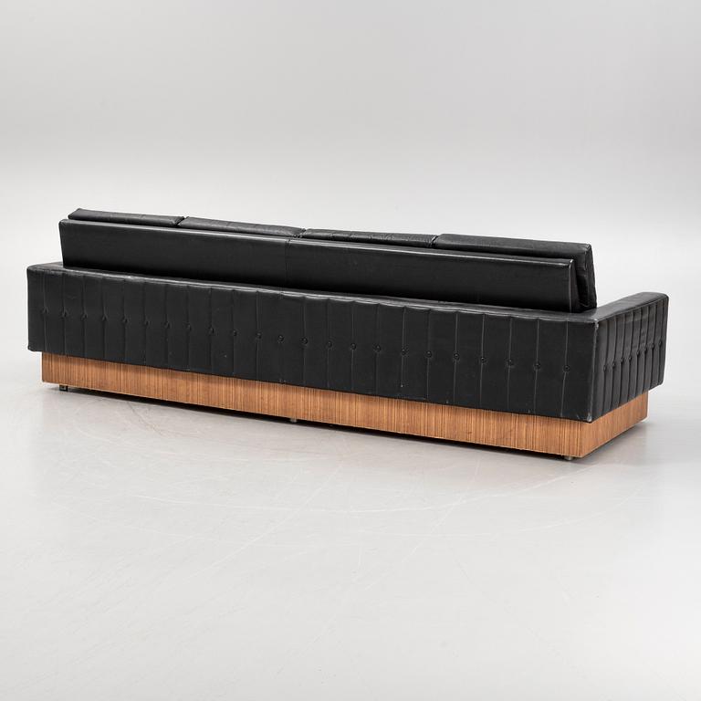 A 1970's leather sofa.