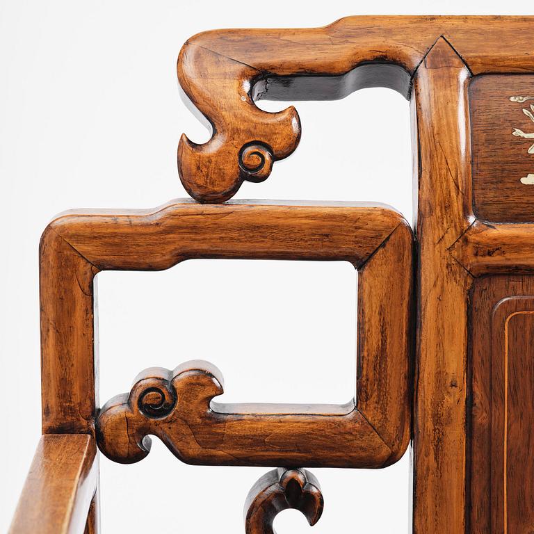 A pair of hardwood armchairs, late Qing dynasty.
