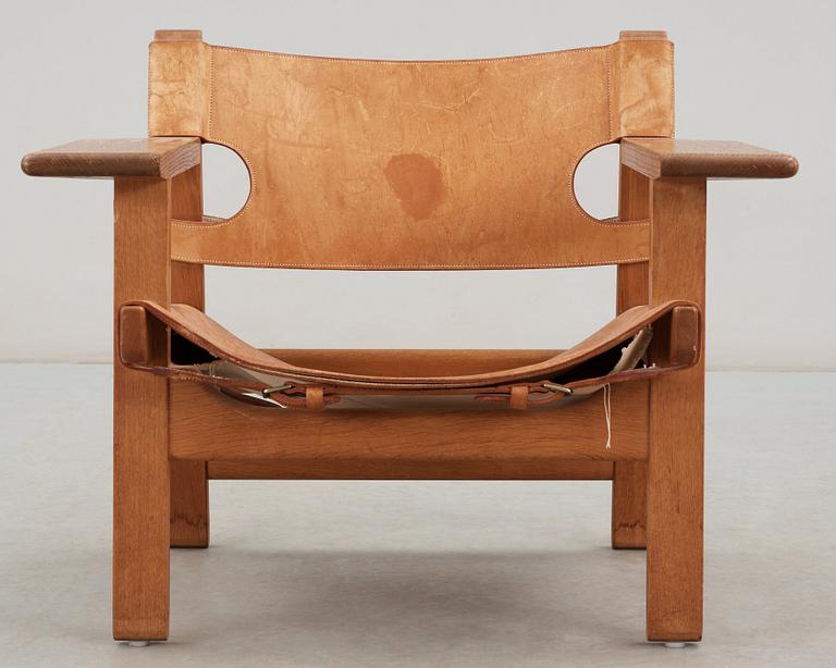 A Børge Mogensen oak and leather 'Spanish Chair' by Fredericia Stolefabrik, Denmark.