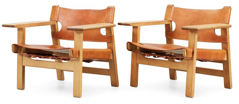 A pair of Børge Mogensen 'The Spanish Chair' in oak and leather by Fredericia Stolefabrik, Denmark.
