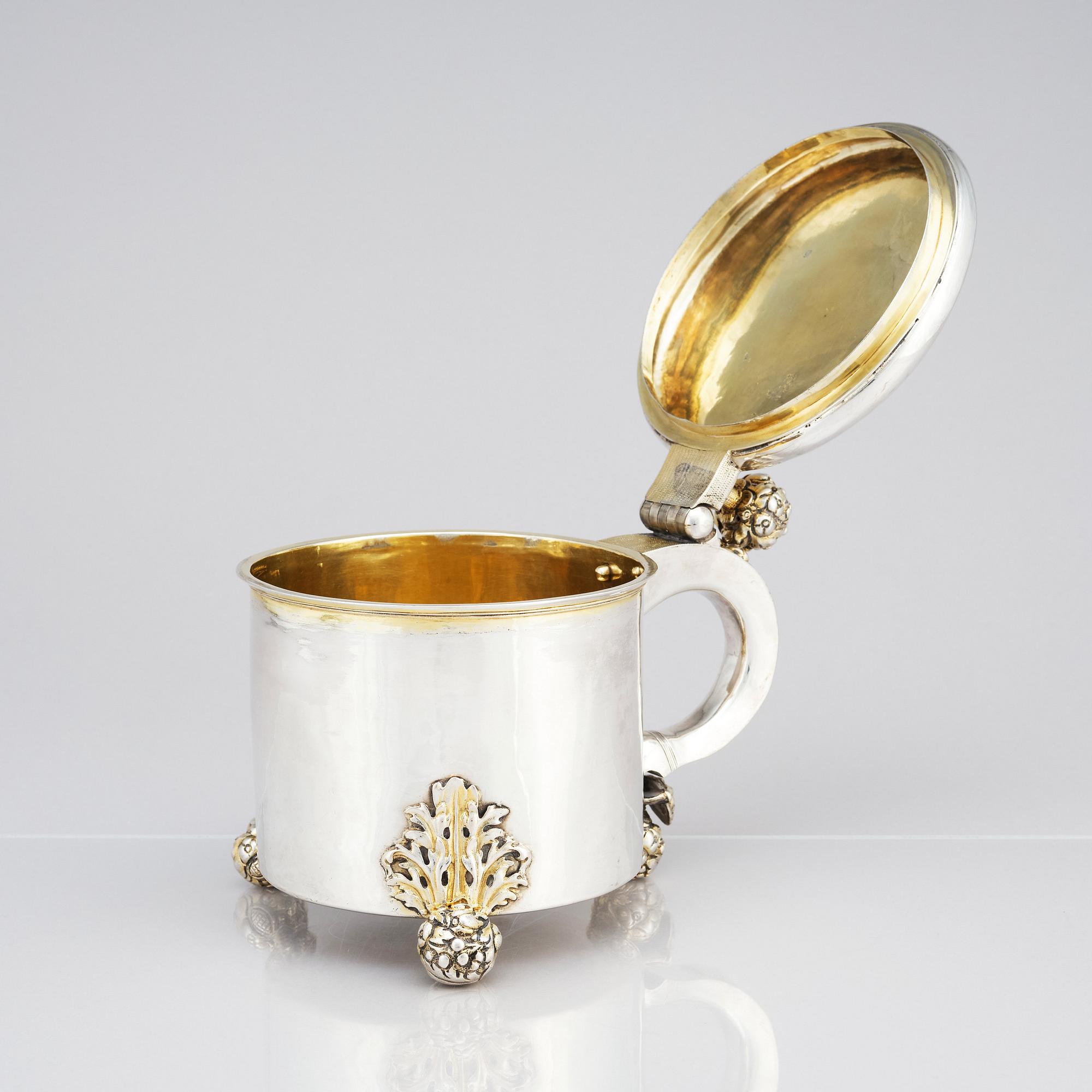A Swedish late 17th/early 18th century parcel-gilt tankard, mark of Conrad Kampf, Kristianstad (1686-1711).