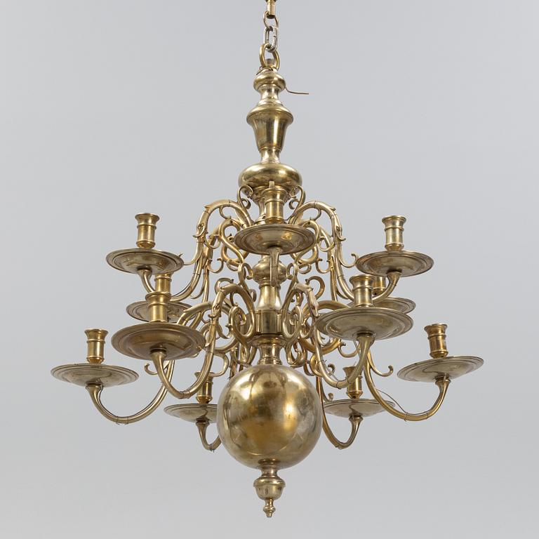 A brass Baroque style chandelier, 20th Century.
