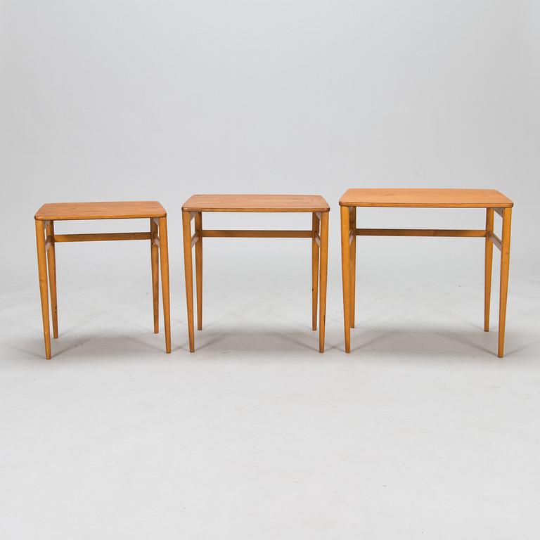 A 3-piece nesting table, mid-20th century.