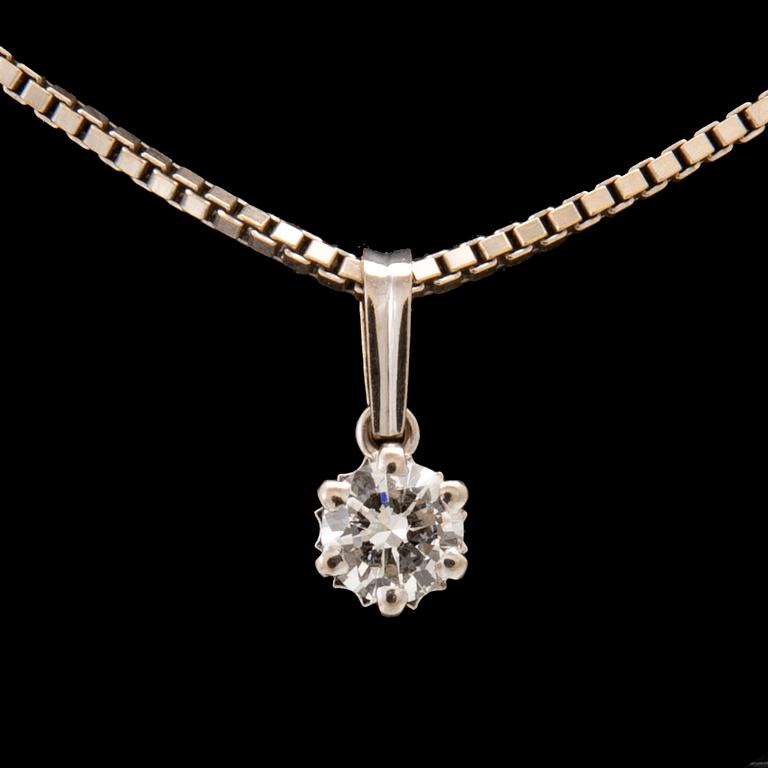 An 18K white gold necklace set with a round brilliant-cut diamond.