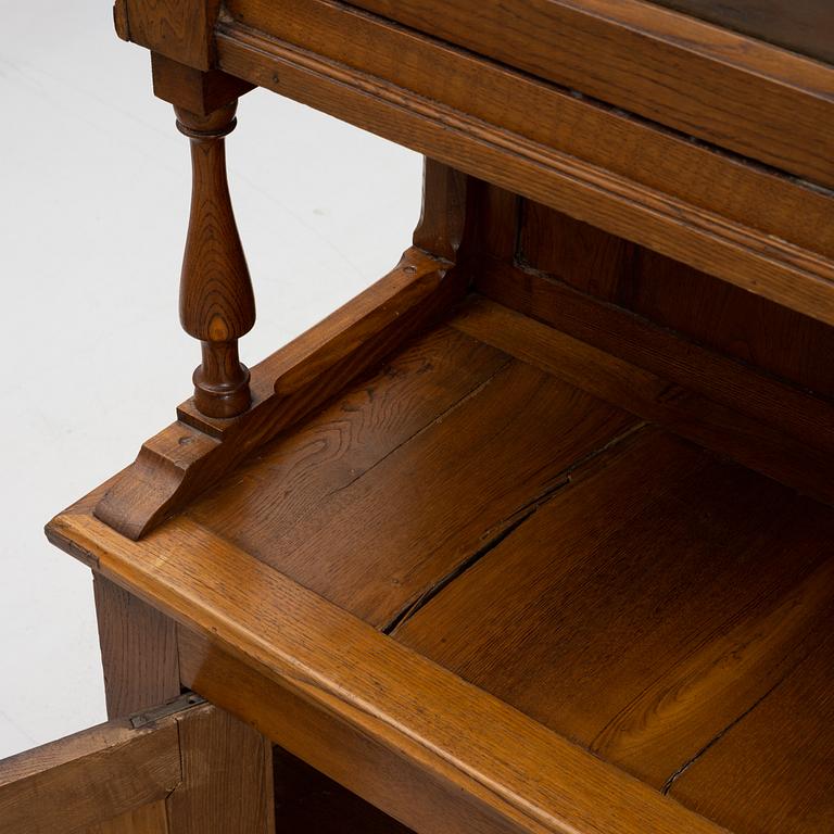 A display cabinet, circa 1900.