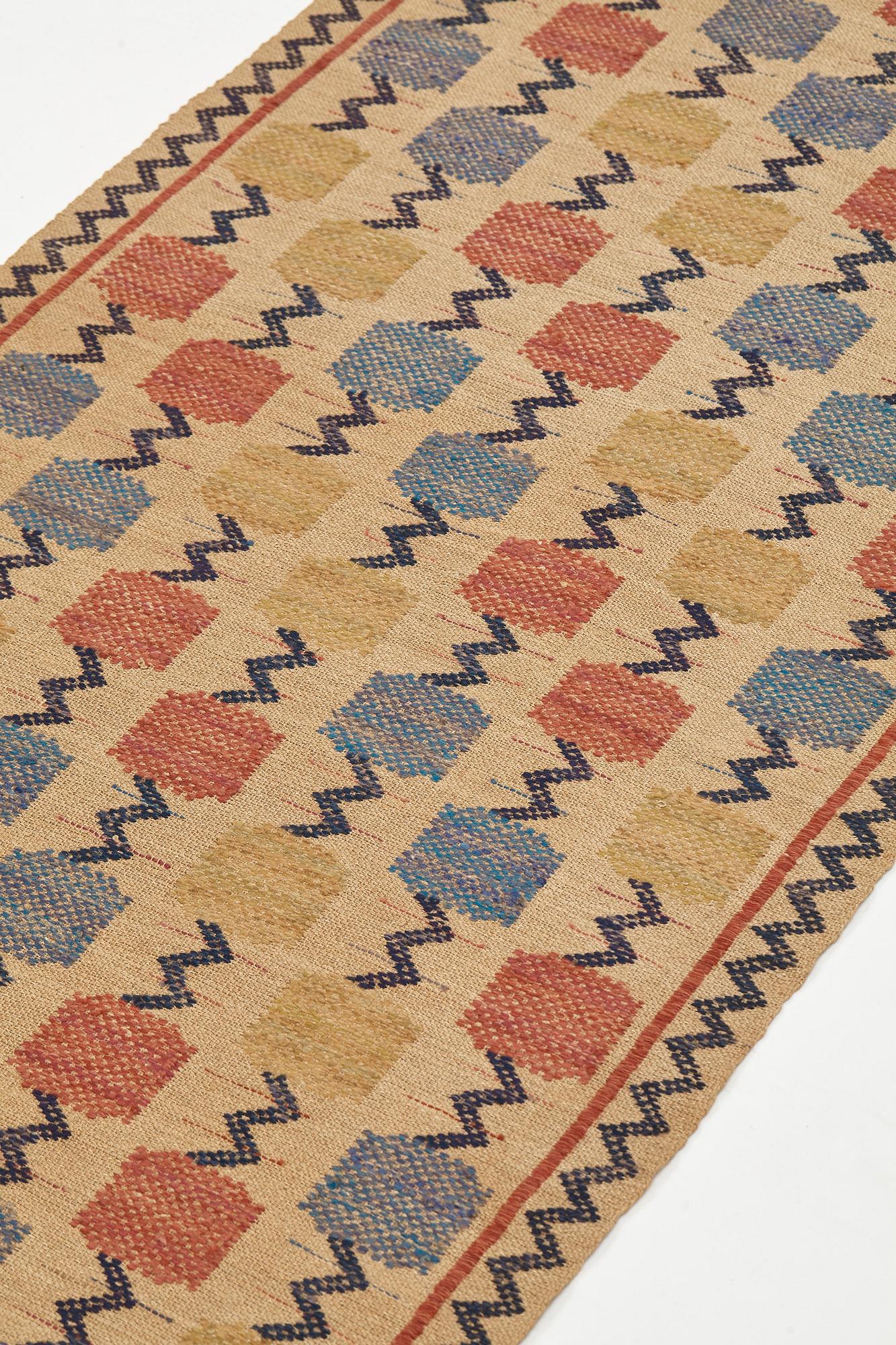 Märta Måås-Fjetterström, A TEXTILE, "Skaftblomman", flat weave, ca 192 x 76 cm, signed MMF.