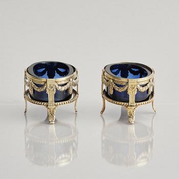 A pair of Swedish 18th century silver and blue glass salt cellars, mark of Pehr Zethelius, Stockholm 1775.