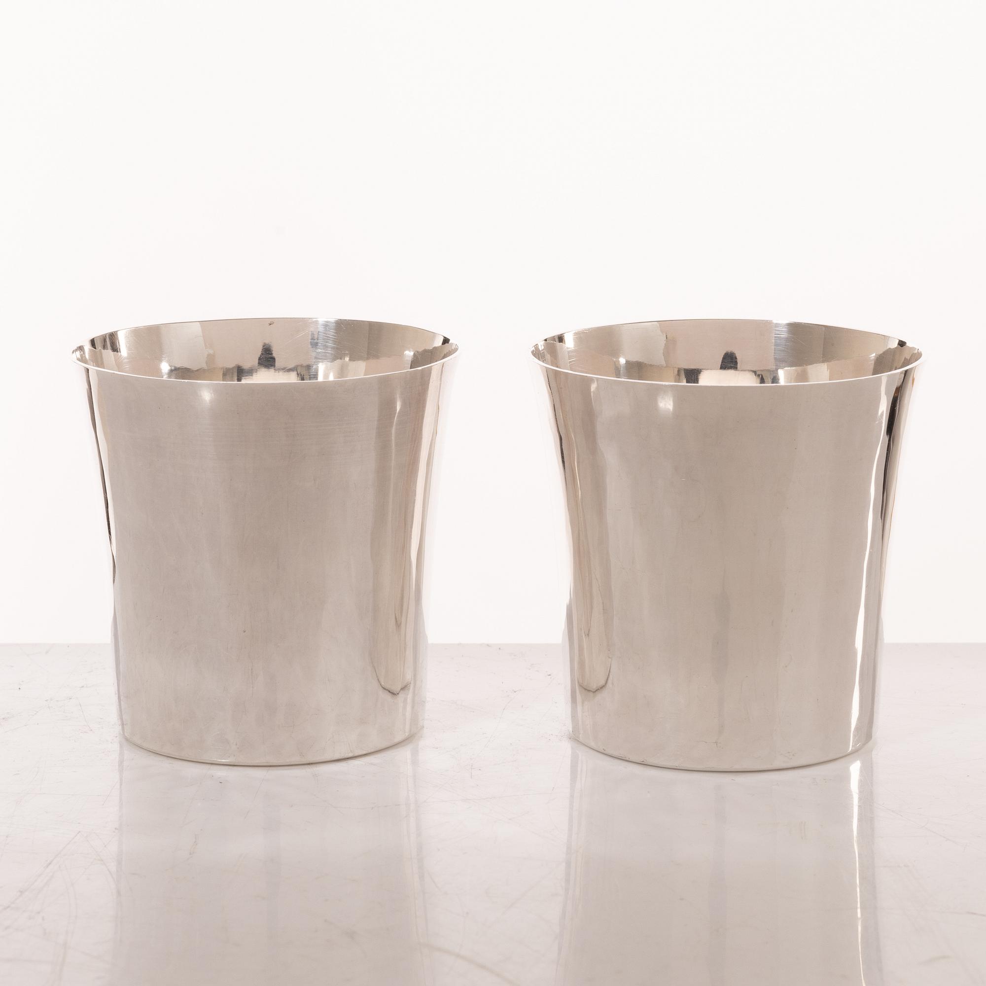 Eric Löfman, A set of twelve silver beakers, KG Markström, Uppsala 1975.