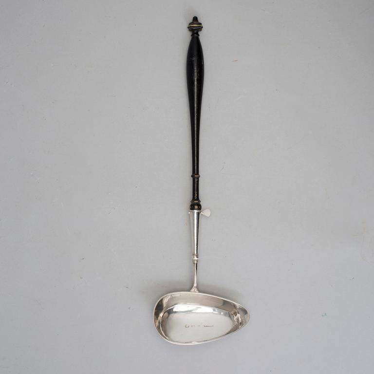 A silver soup ladle by silversmith Anders Emanuel Blomquist, made in Vadstena in Sweden in 1837. Weight ca 117 grams.