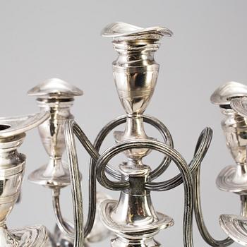 A PAIR OF SILVER PLATE CANDELABRA, regency style, England, first half of the 20th century.