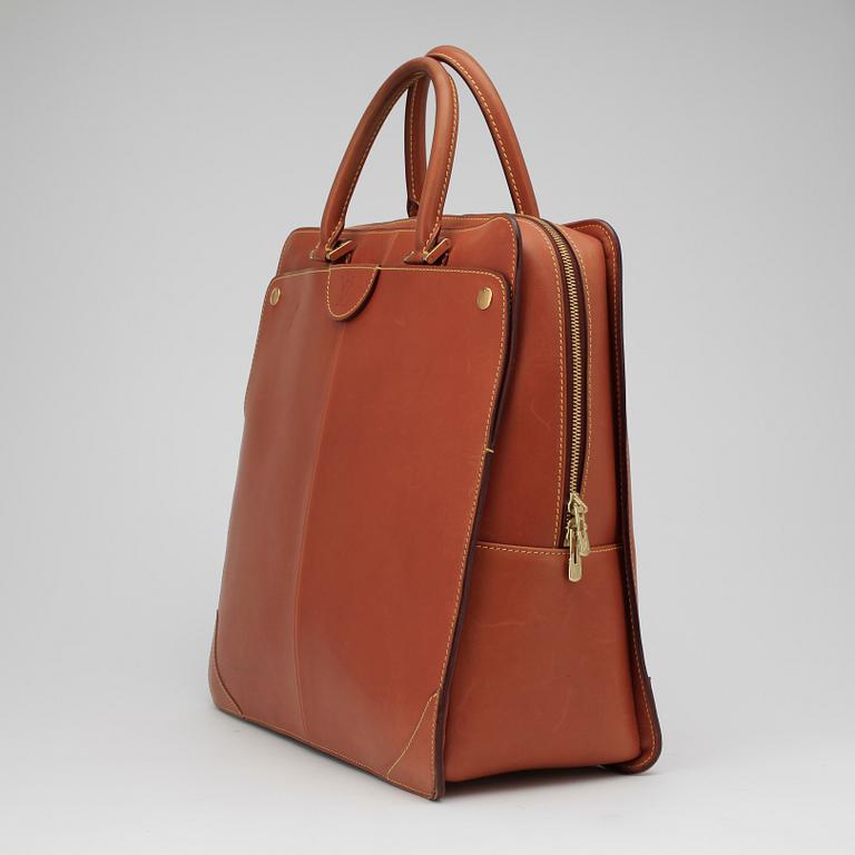 LOUIS VUITTON, a brown leather handbag.